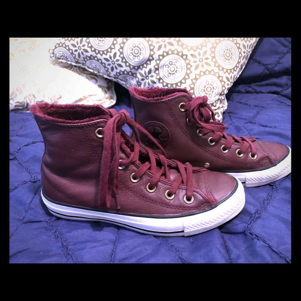 Leather converse high tops.